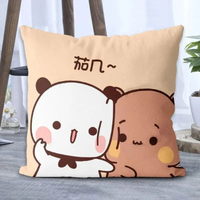 Decorative pillow with cartoon panda and bear design on a neutral background
